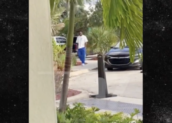 Footage Emerges: Diddy Seen Pacing at Airport After Federal Raids